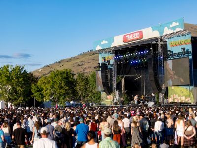 Concert goers enjoying the music at the main stage of the 2025 ZooTown Festival
