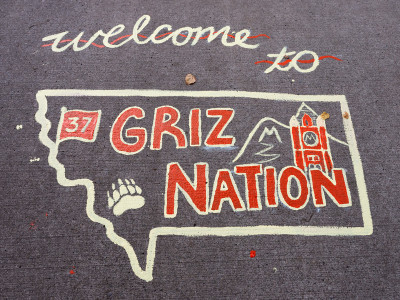 Sidewalk art saying welcome to Griz Nation