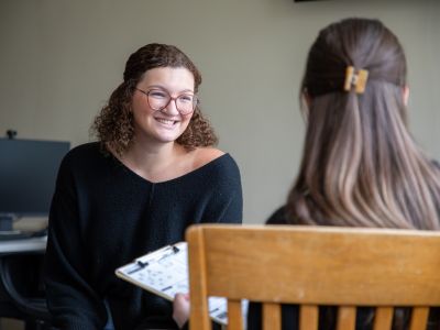 Student sits in a counseling session