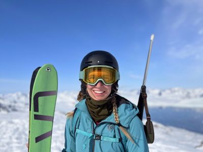 Tele Skier on Top of Mountain