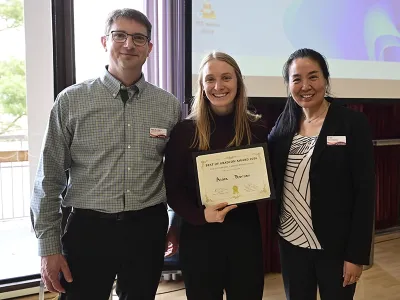 Ande Peersen posing with two people