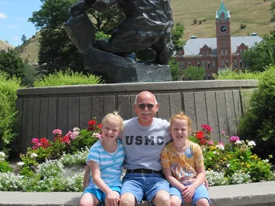 allison mcjannett with sister and grandpa