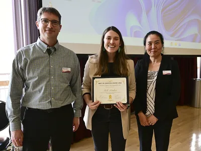 Beth Louden posing with two people