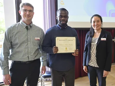 Ndiana-Abasi Sunday posing with two people