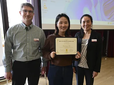 Wenting He posing with two people