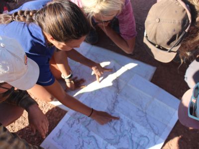 Students consulting a map in Colorado