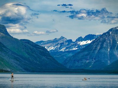 Paddle Boarders on Lake in Glacier