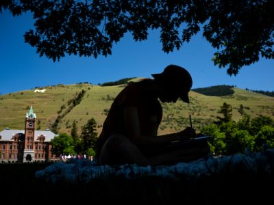 Student studying on UM campus
