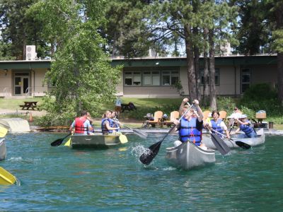 Schwanke participants canoeing on Flathead Lake