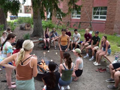 Schwanke participants making smores on UM campus.
