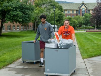 Staff helping students move in to the residence halls.