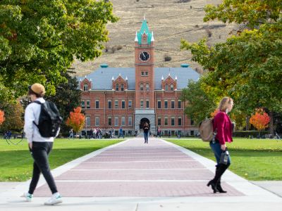 View of students and main hall in the fall