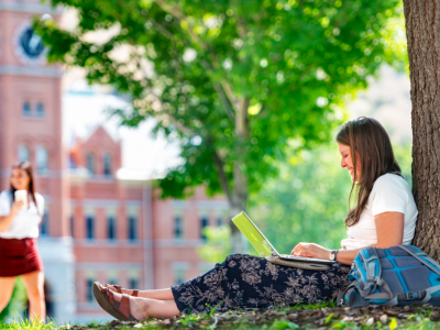 Student relaxing on laptop