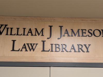 Plaque with Law Library's name.