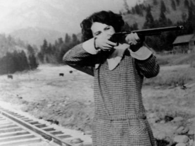 Alma LaForge Rooney with rifle