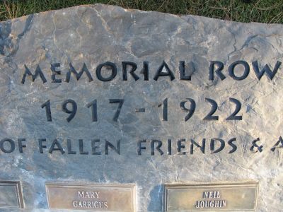 The carving at the top of the new monument: Memorial Row, 1917-1922.