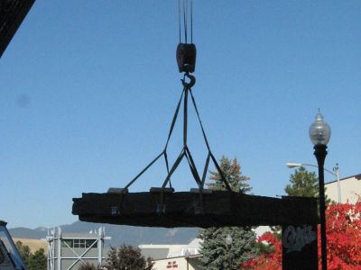 Photo of a crane putting the new monument in place