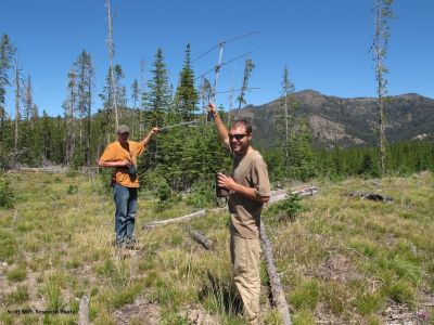 lab member using equipment in the field