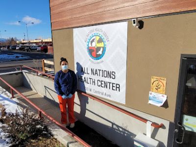 nurse in front of All Nations Building