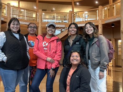 IGSA group taking a picture in the PFNAC Rotunda after an event