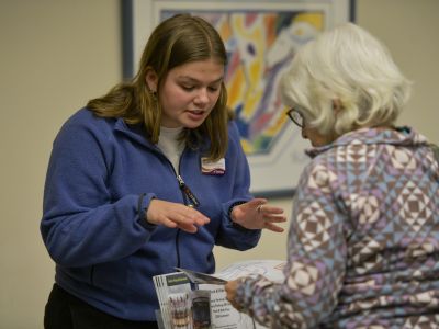 a person helping another person