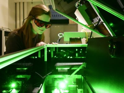 Student with research laser