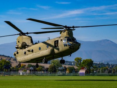 an ROTC helicopter landing in a field