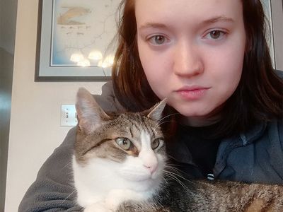 michelle holds her cat