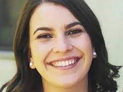 sierra smiles at the camera