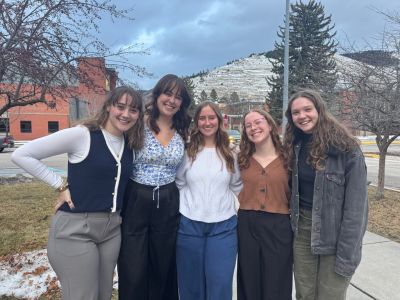 five students posing