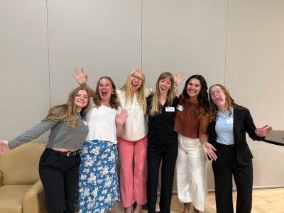 six students posing and making silly faces