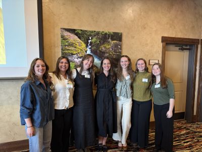 seven students at a conference