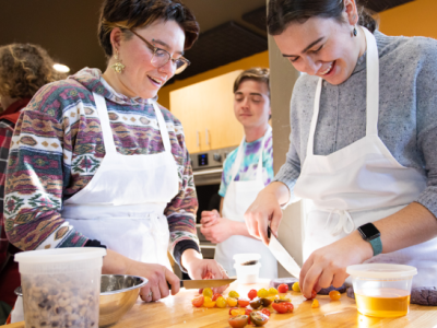 students cooking with tomatoes
