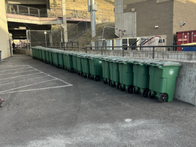compost bins in a row outside the stadium
