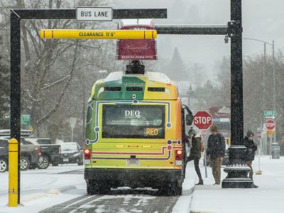 people boarding red line in the snow