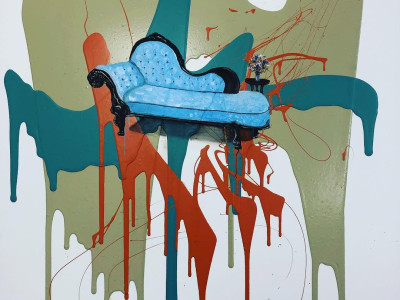center is a blue vintage chaise lounge surrounded by large looping splotches of color in teal, red, olive green