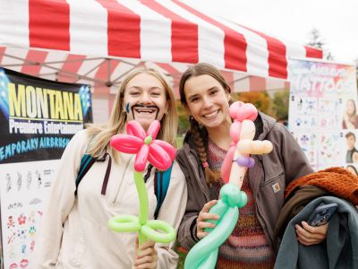 two girls at a carnival