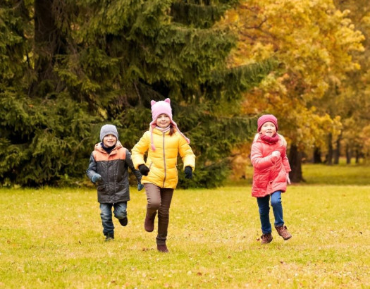 Kids running in a field