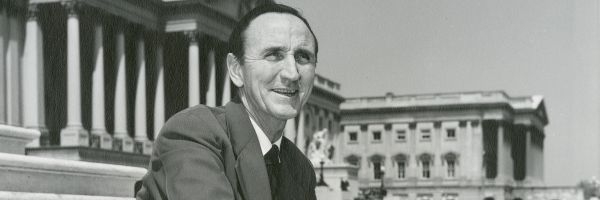 Mike Mansfield sitting on steps of the US capitol building