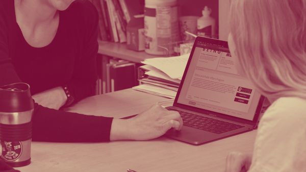 Pre Law Advisor Soazig Lebihan works with a student in her office at the 51�Թ���