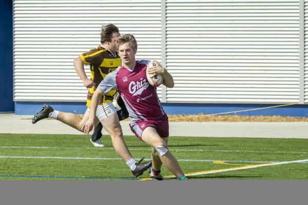 rugby player running with ball