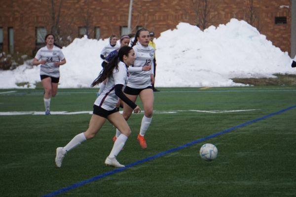 Women's club soccer team in a game