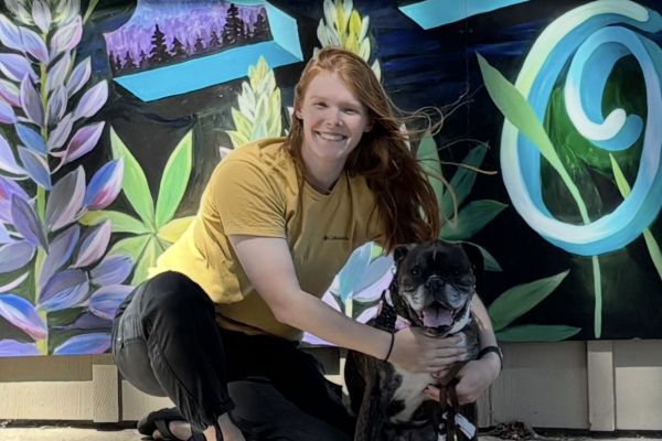 Britney hugging a dog