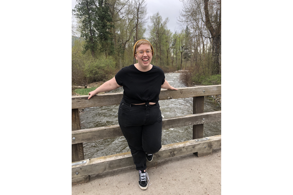 Hannah Gibbs on small bridge over creek