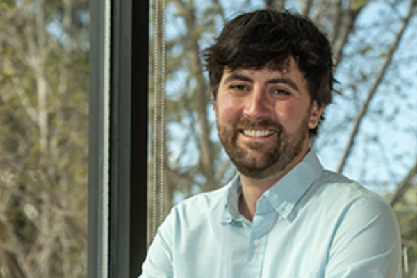 headshot of Alex Dreussi