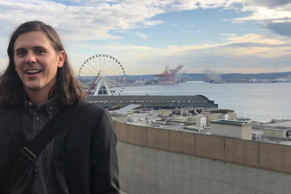 Daniel Salois standing near harbor