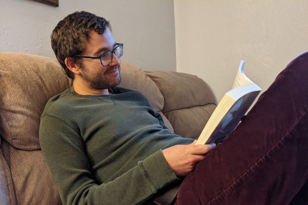 Dillon Sarb reading a book