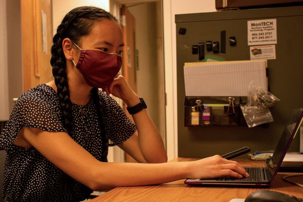Jaynee Bohart working on a computer