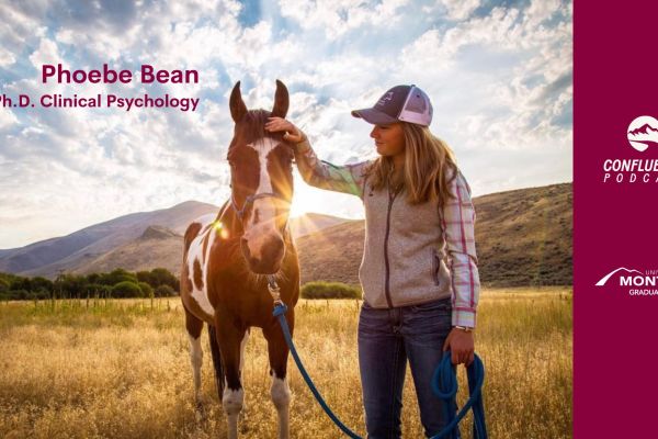 Phoebe Bean petting a horse on the head