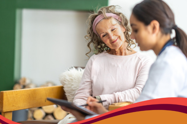 photo of health worker asking questions of an older woman